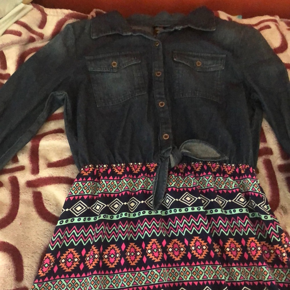 a kids medium denim dress.